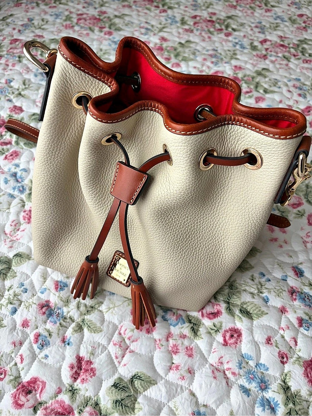 Dooney & Bourke Pebbled Leather Drawstring Bucket Bag in Cream & Brown